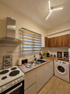 Kuchyň nebo kuchyňský kout v ubytování Lo Más Bonito Apartment