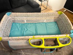 a suitcase with a yellow and blue inside at Villa Toscana Untersteinach in Untersteinach