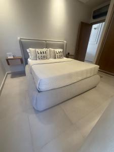 En eller flere senge i et værelse på Aqua Vista Retreat + 21 billeder