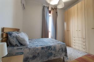 Postel nebo postele na pokoji v ubytování Casa vacanze sul mare