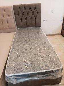 Postel nebo postele na pokoji v ubytování العنبق هاوس + 11 fotografií