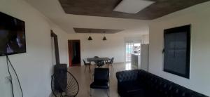 a living room with a couch and a table at La paz in Médanos