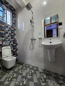 Ένα μπάνιο στο New Janda Lodge INN