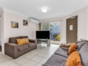 Μια τηλεόραση ή/και κέντρο ψυχαγωγίας στο Cabarita Beachfront Poolside 23