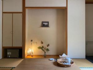 Postel nebo postele na pokoji v ubytování Sounkyo Onsen Hotel Kumoi