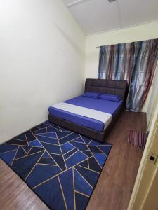 Katil atau katil-katil dalam bilik di dD Home Stay Gombak at KL