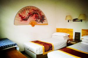 Afbeelding uit fotogalerij van Three Legged Frog Hostel(Beijing Tian'anmen Dashilan) in Beijing