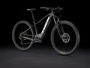 a black bike parked in a dark room at Yurts in Cyprus - Koliba Tiny House in Simou