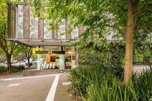 a puma store on the side of a building at Sleek&Stylish Corner Apt on TopFloor Southbank Vic in Melbourne