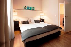 Cama ou camas em um quarto em Hotel Victoria