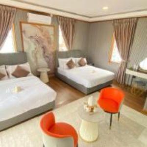 Postel nebo postele na pokoji v ubytování Blue Ocean Resort