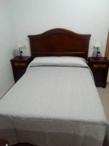Postel nebo postele na pokoji v ubytování Hostal Batato