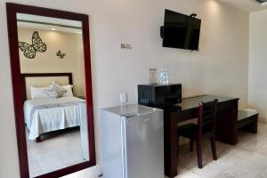 Uma cama ou camas num quarto em Hotel Yorio Inn