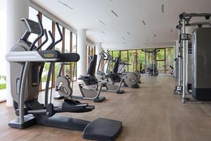 a gym with a row of treadms and cardio machines at Punta Mita Beachfront Ocean Views BOLONGO in Higuera Blanca