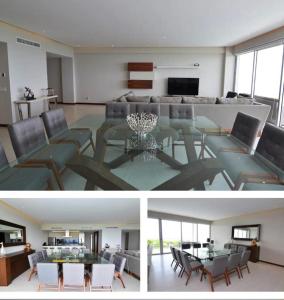 a living room and dining room with a glass table at Punta Mita Beachfront Ocean Views BOLONGO in Higuera Blanca