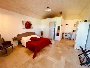 Ένα ή περισσότερα κρεβάτια σε δωμάτιο στο Masseria Signora Cecca