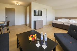 Voodi või voodid majutusasutuse VitalBoutique Hotel Zurzacherhof toas