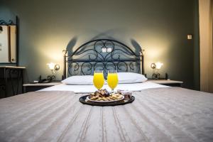 Postel nebo postele na pokoji v ubytování Anita Hotel