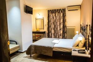 Postel nebo postele na pokoji v ubytování Anita Hotel