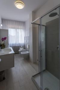 Kylpyhuone majoituspaikassa St. Vitale’s Basilic view elegant apartment