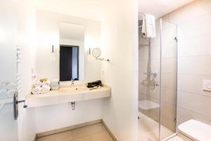 Koupelna v ubytování Hotel Novum