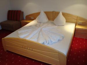 Säng eller sängar i ett rum på Ferienhaus Kahr Appartment Roßbrand