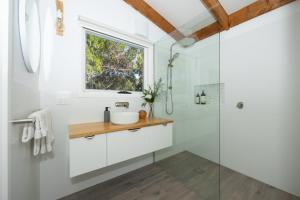 a bathroom with a sink and a shower at The Avenue in Anglesea +40 photos