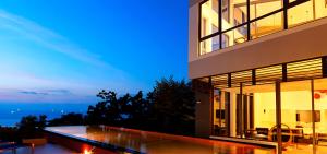a house with a view of the ocean at night at Villa181 in Ko Lanta