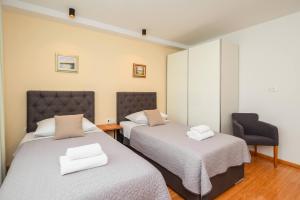 Postel nebo postele na pokoji v ubytování Boutique rooms Kican