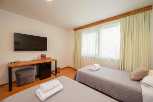Postel nebo postele na pokoji v ubytování Boutique rooms Kican