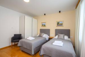 Postel nebo postele na pokoji v ubytování Boutique rooms Kican