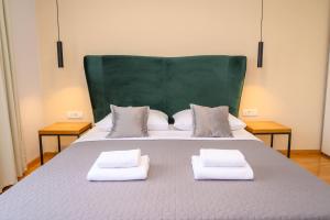 Postel nebo postele na pokoji v ubytování Boutique rooms Kican