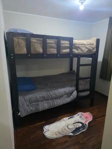 a couple of bunk beds in a room at RODRICH apartment 2 in Lima +51 photos