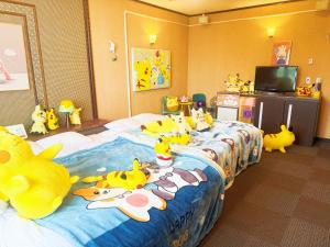 Giường trong phòng chung tại Ikaho Kids Paradise Hotel - Vacation STAY 06984v