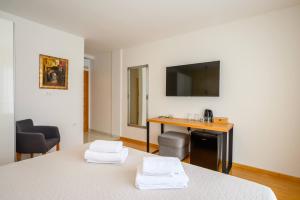 TV a/nebo společenská místnost v ubytování Boutique rooms Kican