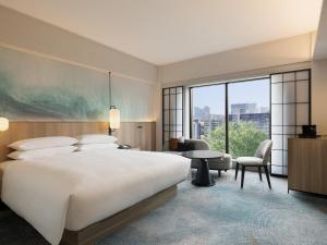 Ένα ή περισσότερα κρεβάτια σε δωμάτιο στο Sheraton Miyako Hotel Tokyo