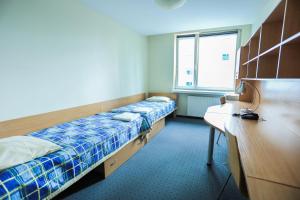 Posteľ alebo postele v izbe v ubytovaní Hotel Krakowiak