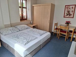 Postel nebo postele na pokoji v ubytování Penzion U Vorlíčků