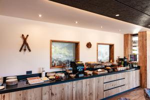 Kuchyň nebo kuchyňský kout v ubytování Dolomites Room and Breakfast Formiè