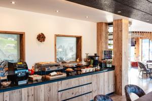 Kuchyň nebo kuchyňský kout v ubytování Dolomites Room and Breakfast Formiè + 37 fotografií