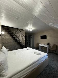 Voodi või voodid majutusasutuse Imperial Hotel toas