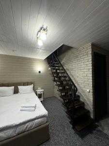 Voodi või voodid majutusasutuse Imperial Hotel toas