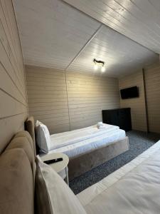 Voodi või voodid majutusasutuse Imperial Hotel toas