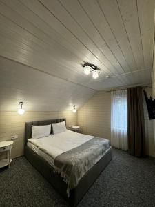 Voodi või voodid majutusasutuse Imperial Hotel toas