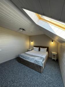 Voodi või voodid majutusasutuse Imperial Hotel toas
