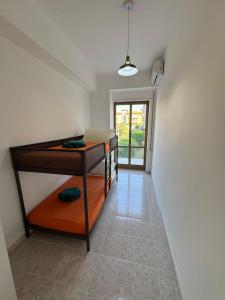 Katil atau katil-katil dalam bilik di Spacious and bright apartment in Catania - central