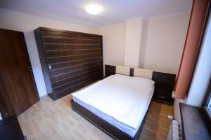 Postel nebo postele na pokoji v ubytování Holiday Olimp Hotel + 16 fotografií