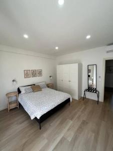 Llit o llits en una habitació de Appartamento di lusso con 3 camere da letto 22 fotos més