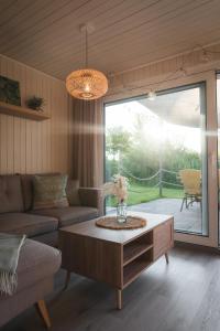 Posezení v ubytování Lieblingsplatz Parey - Ferienhaus Deluxe