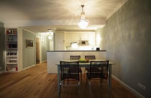 a kitchen with a table and chairs in a room at Jadgschloss zu Hohen Niendorf in Hohen Niendorf